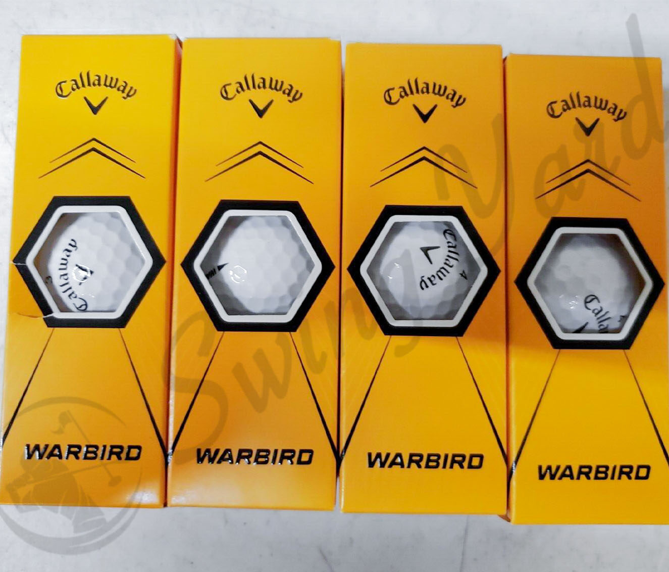 The 4 packs of Callaway Warbird 4 packs on the table