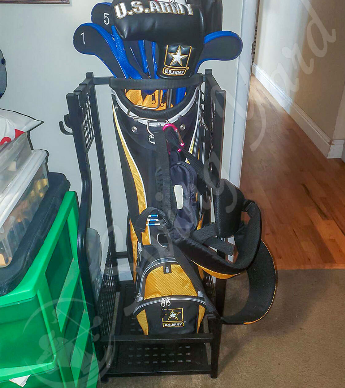A Mythinglogic single golf bag storage organizer set up in my living room