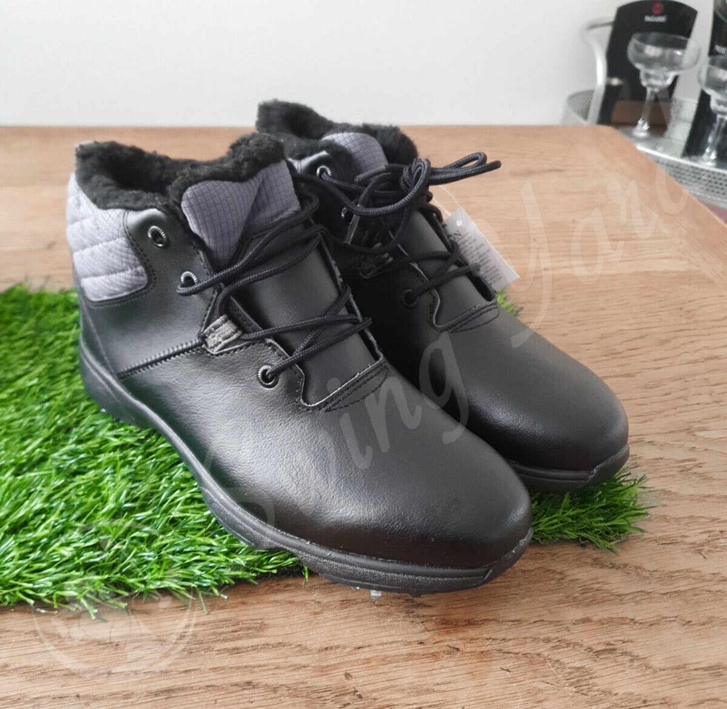 My new FootJoy women golf boots on the artificial grass mat