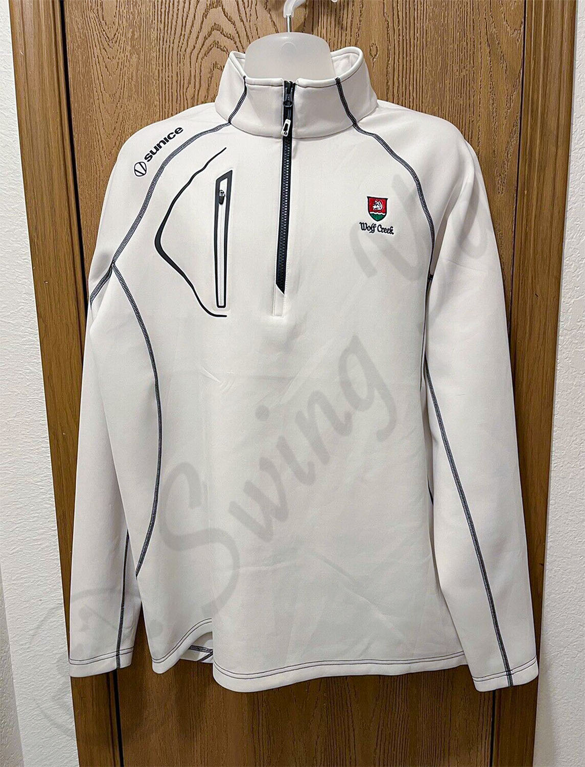 A white Sunice allendale men’s thermal golf jacket pullover in my room