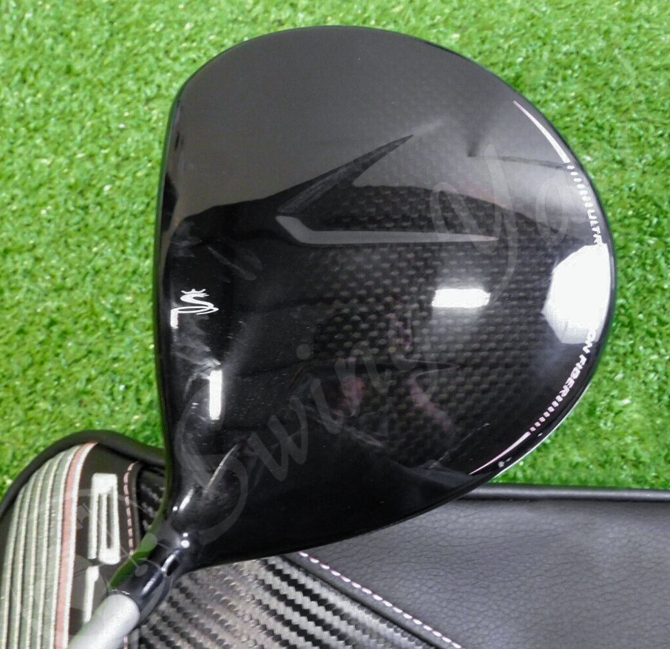 A carbon crown head of Cobra Air X Offset driver at the golf course