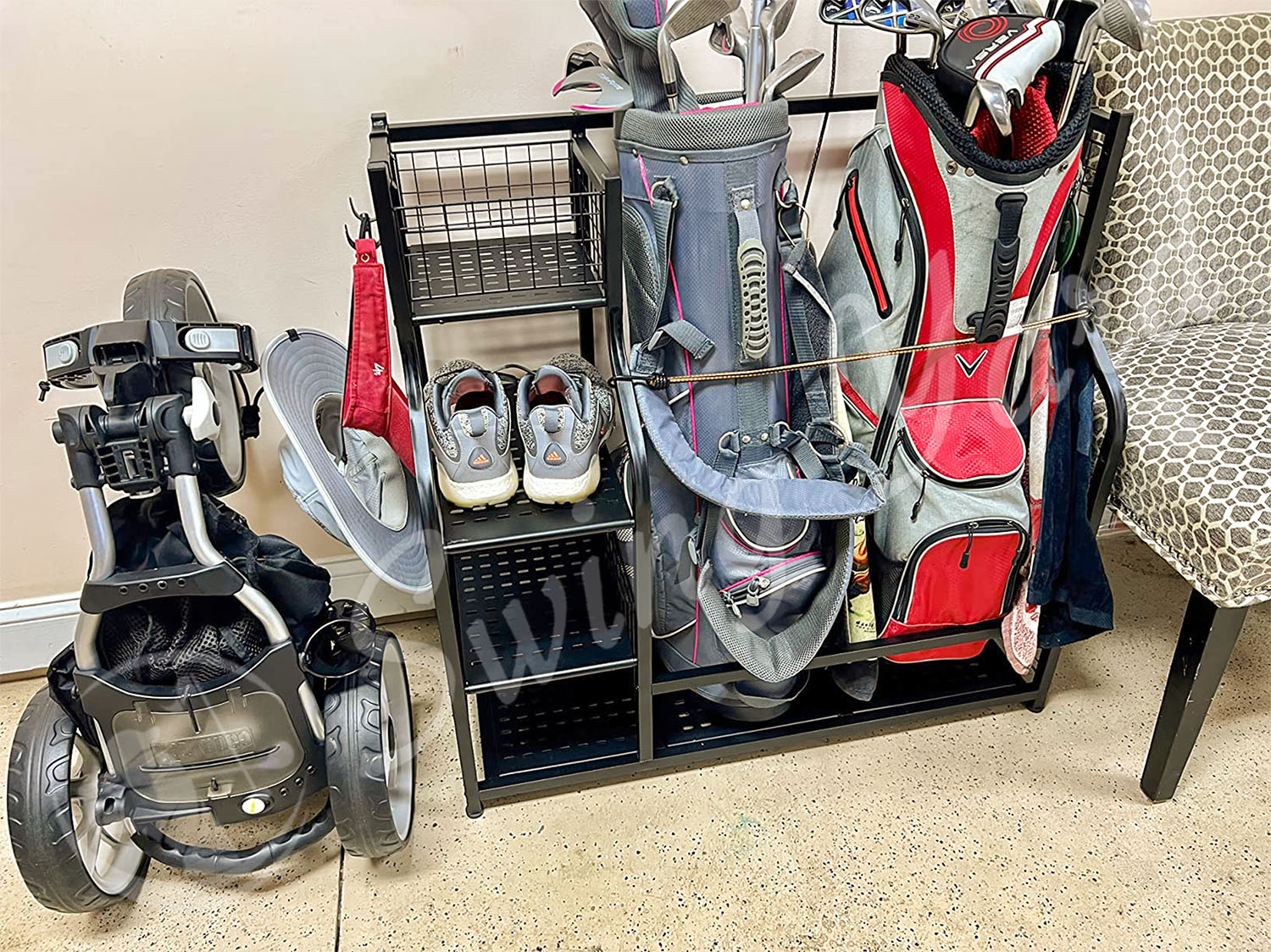 A PLKOW large golf bag rack storage in the golf simulator room