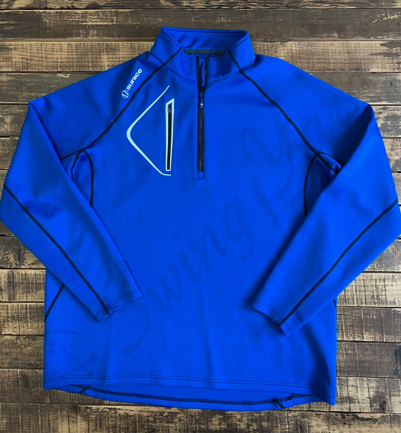 My new blue Sunice allendale men’s thermal golf jacket pullover on the floor