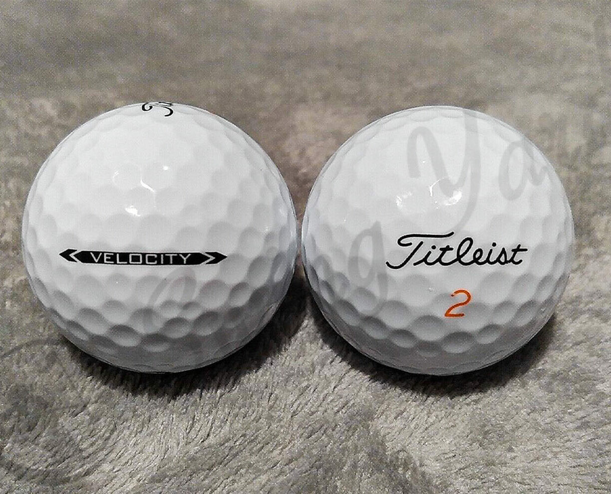 A side and front view of Titleist Velocity golf balls in my living room