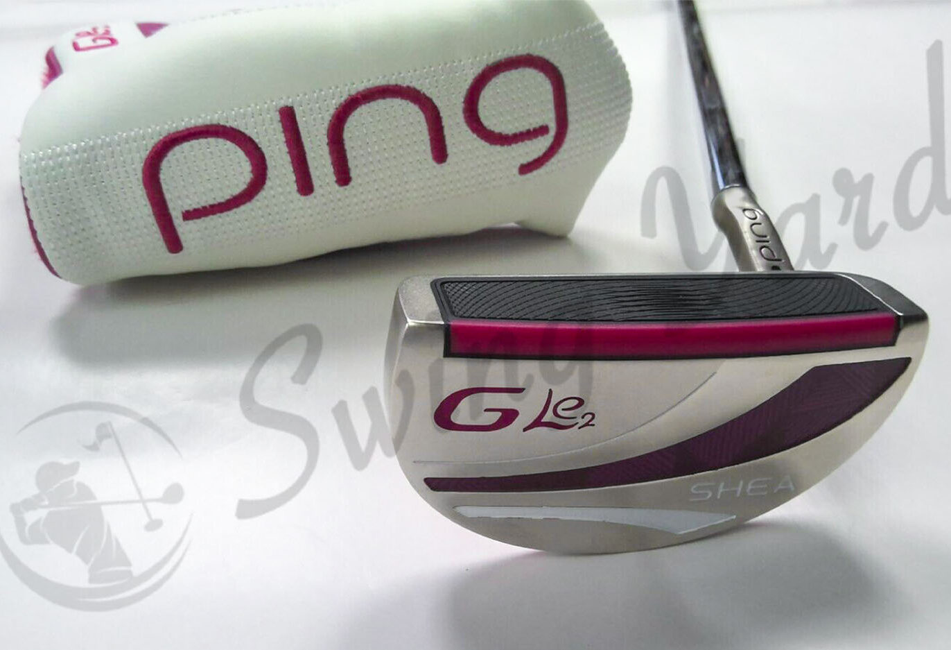 A head cover and Ping GLE 2 Shea Putter in the floor