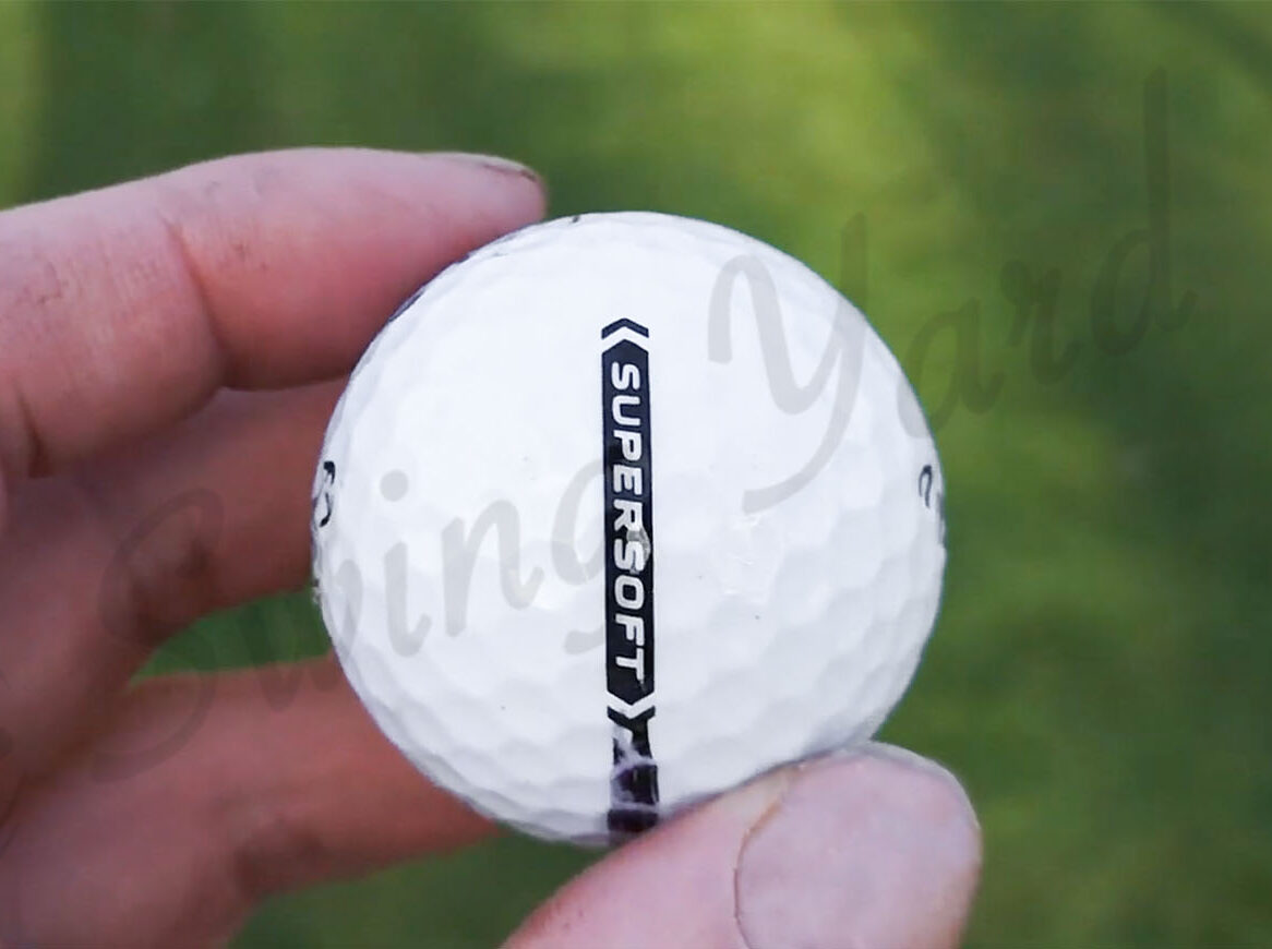 Me holding Callaway Supersoft ball at the golf course