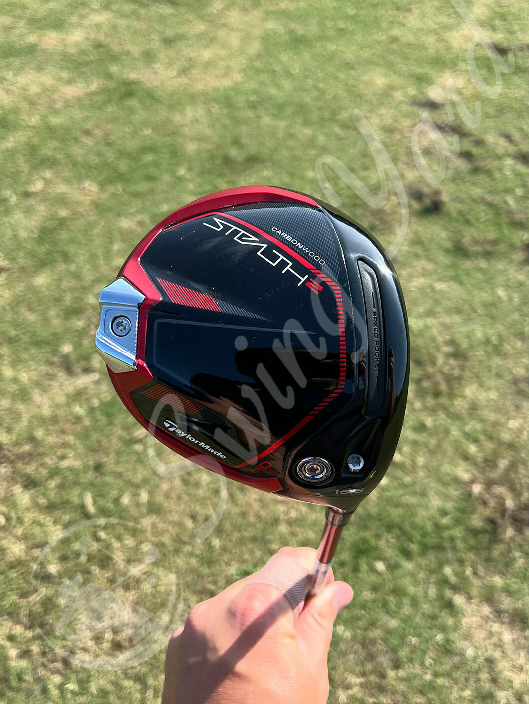 Me holding TaylorMade Stealth 2 HD driver for testing at the golf course