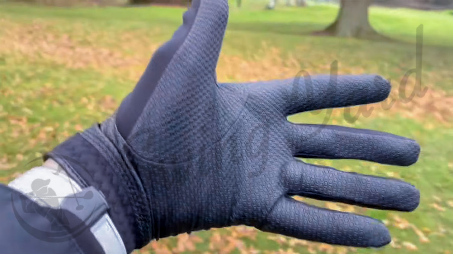 Me testing a Callaway Thermal Grip gloves at the golf course