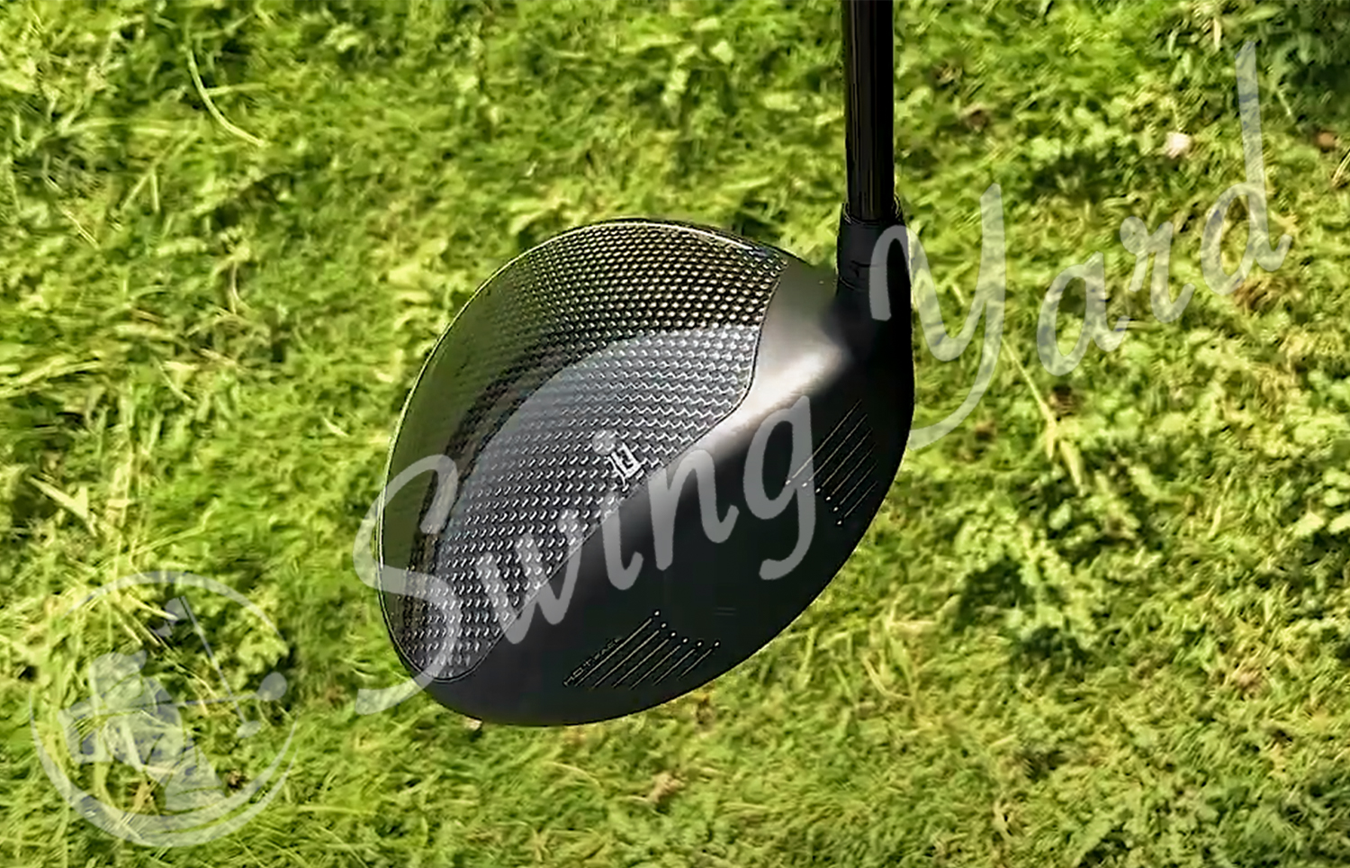 Front view of my black Cobra Aerojet Max driver in the grass