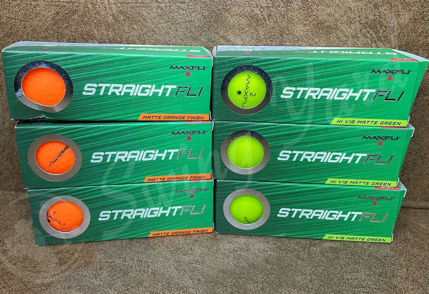 My new matte orange and matte green Maxfli StraightFli golf balls