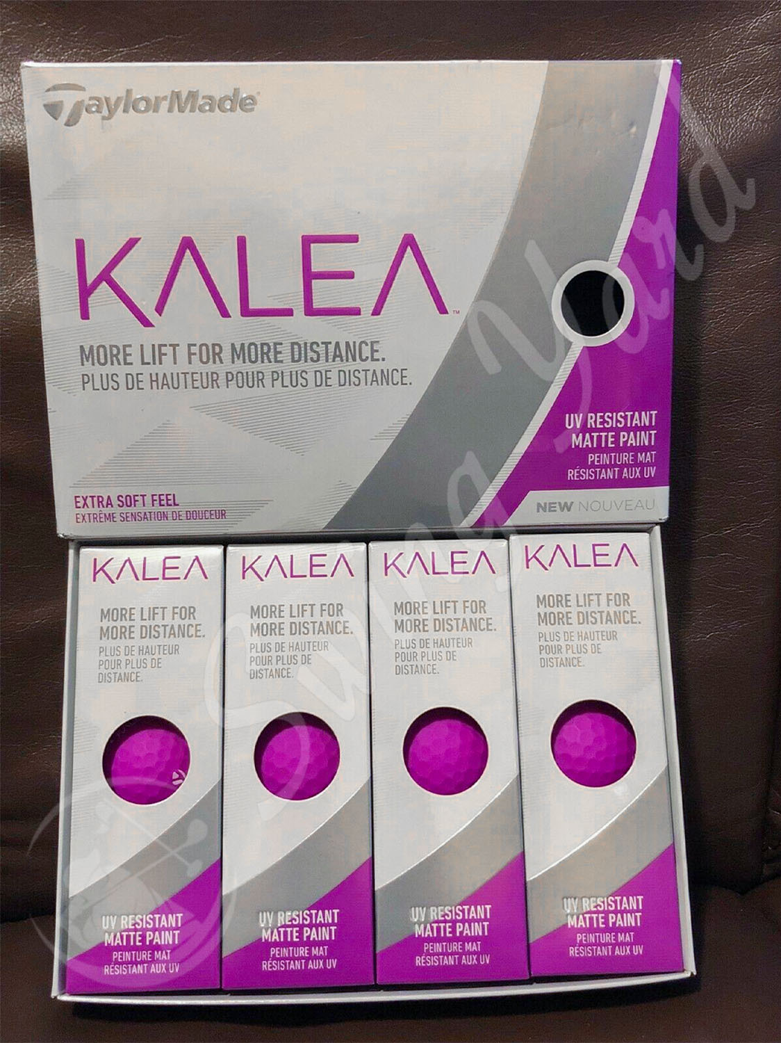 A TaylorMade Kalea box cover and single packs on my sofa