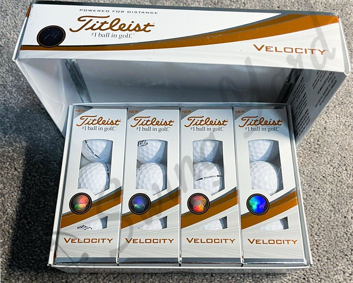 A Titleist Velocity box in the living room