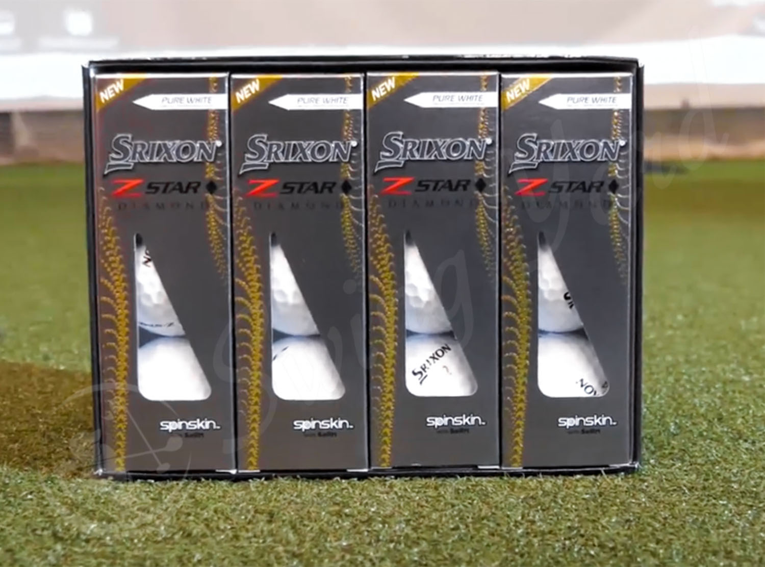 A box of Srixon Z-Star in the grass at the golf course