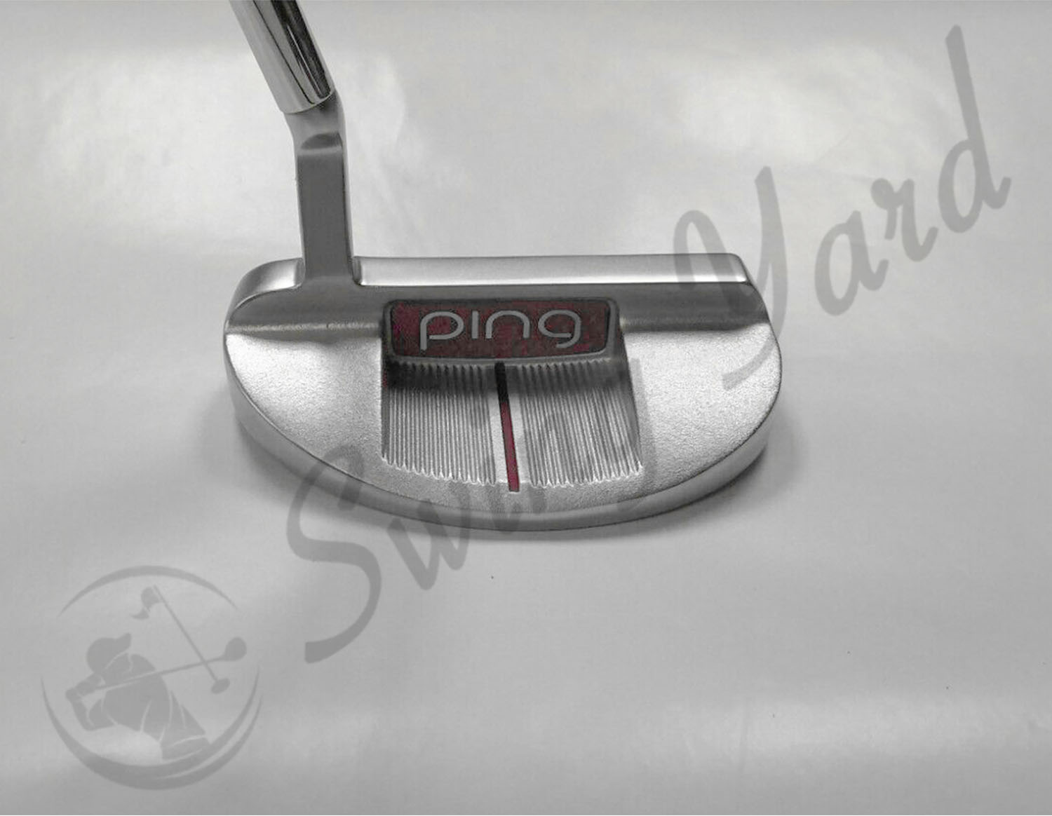 A backside view of Ping GLE 2 Shea Putter in the floor