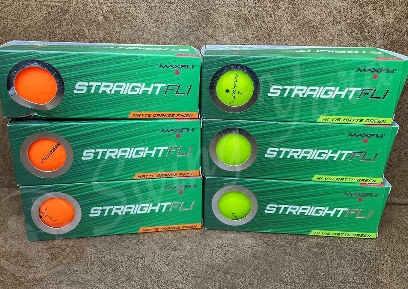 The matte orange and matte green Maxfli StraightFli balls
