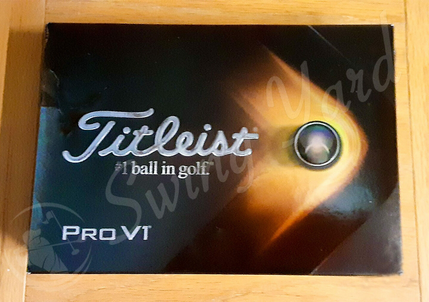 A new Titleist Pro V1 box on the table