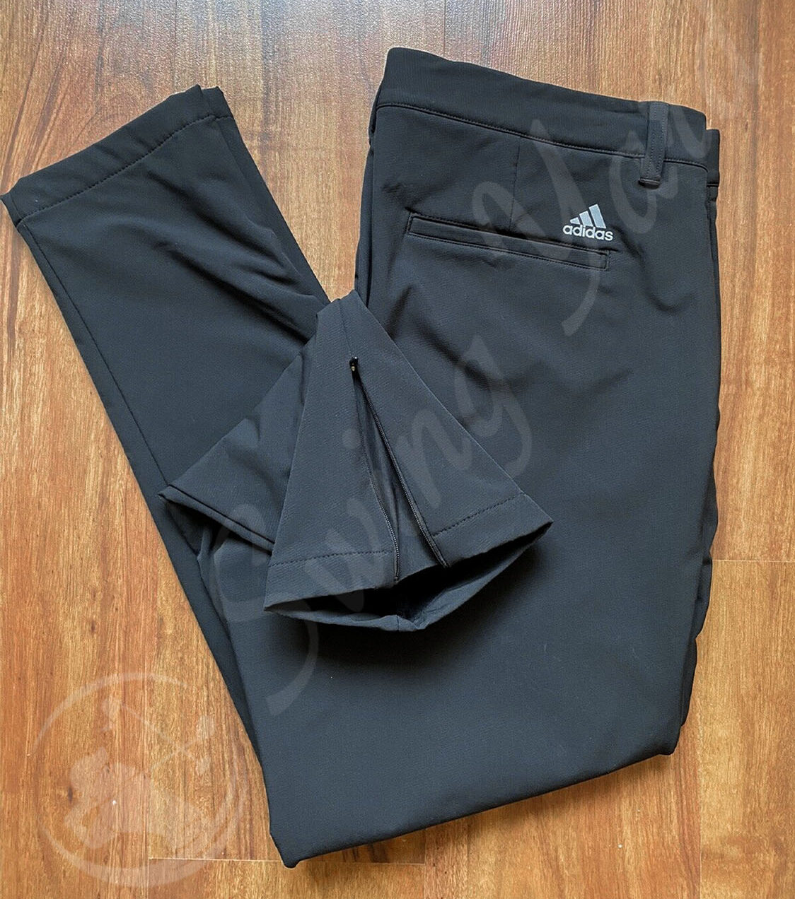 Showing my Adidas frostguard insulated winter golf pants zipper at the bottom hem