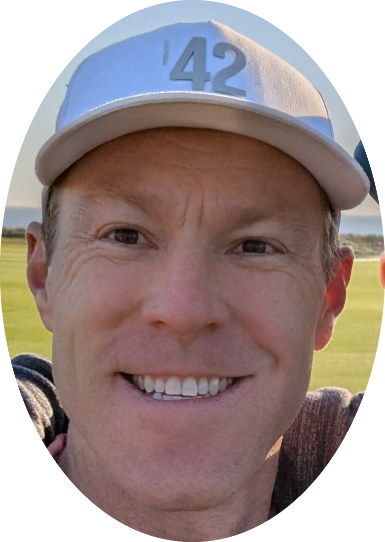 Swing Yard Golf Instructor and Owner Brian Bomgren smiling for a photo