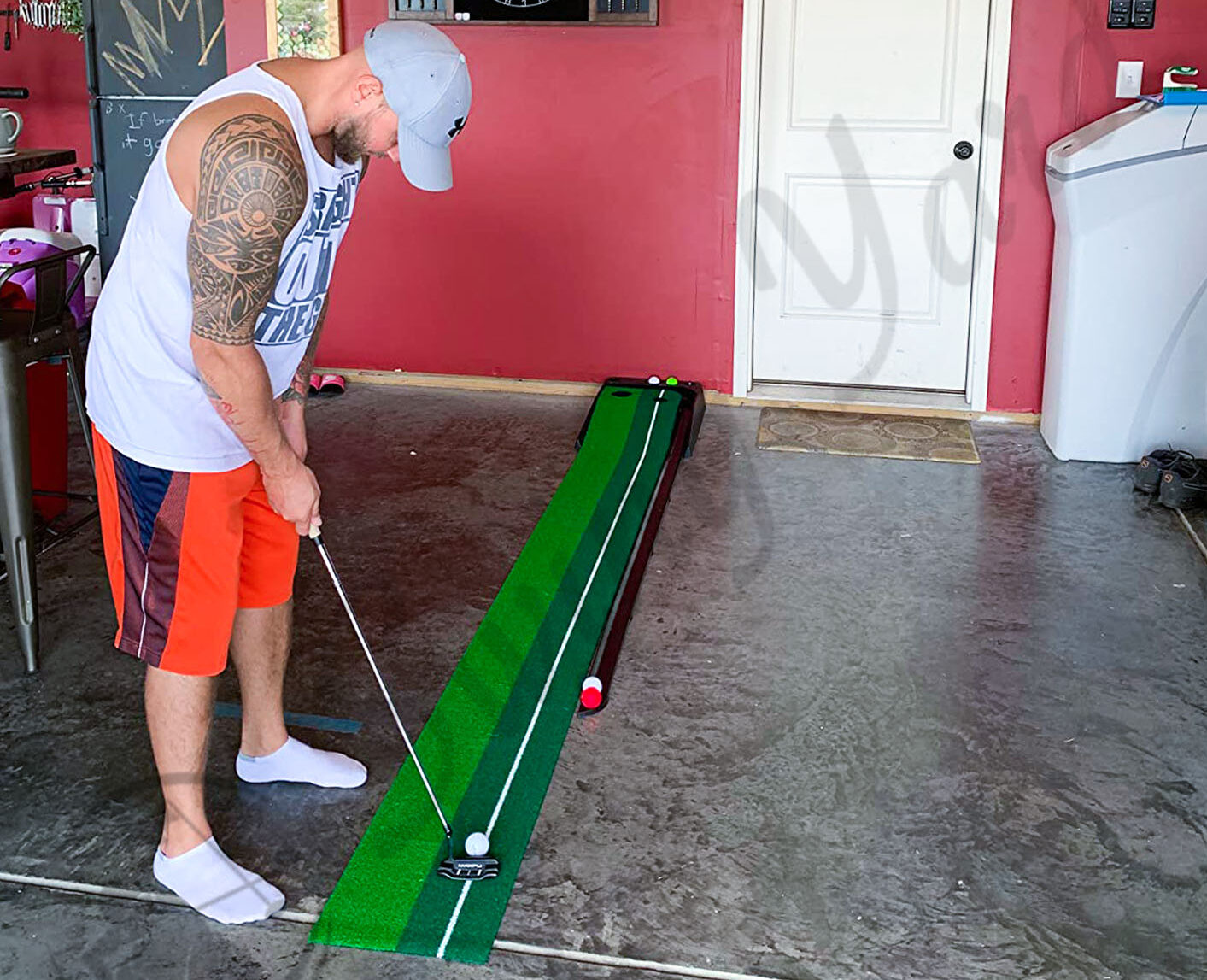 Me putting on the Abco Tech Indoor Putting Green