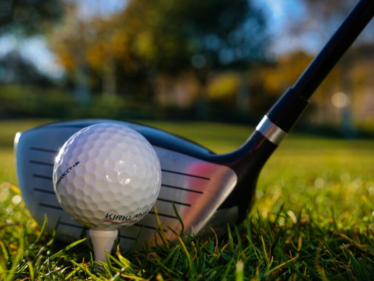 An image of a driver and a golf ball used to engage the audience about the longest flying golf balls of 2024