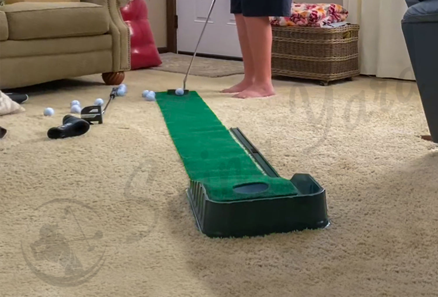 Testing the Club Champ putting set in the living room