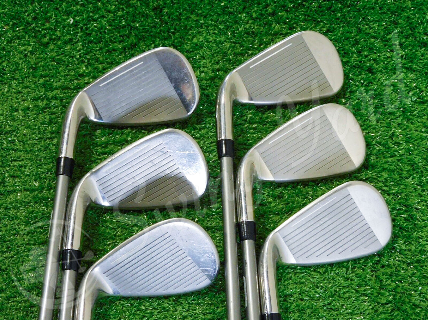 The Cobra Women’s Fly XL Petite Irons set in the grass