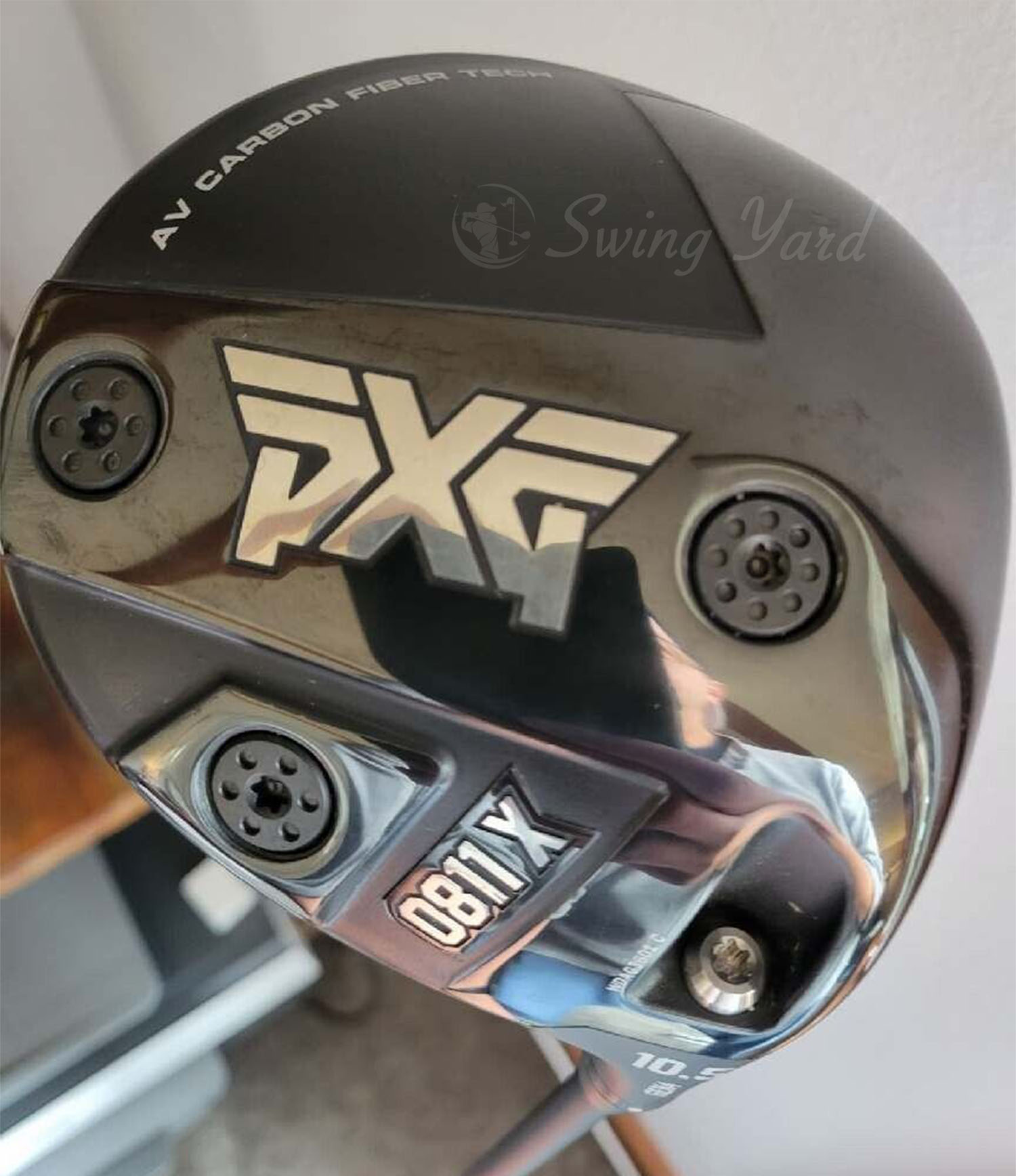 Holding the PXG Gen4 0811X driver in my office
