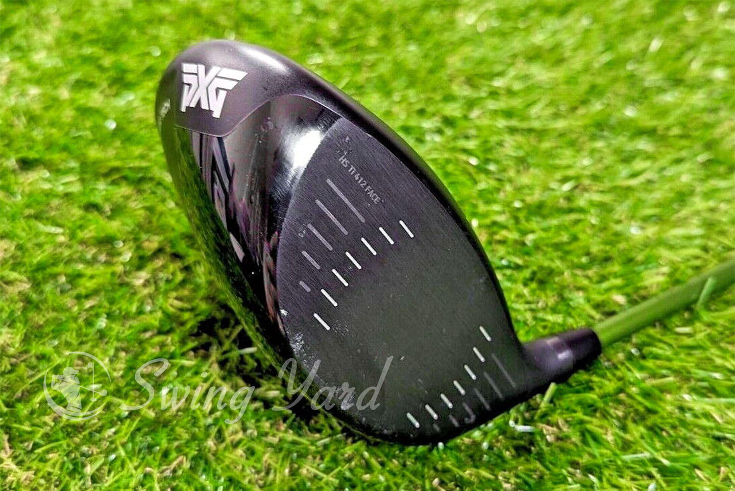 Photo of the PXG driver laying on turf