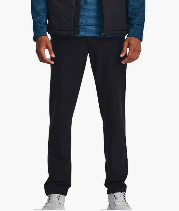 Golfer wearing some of the best golf pants around. Built for maneuverability and make with coldgear infrared by under armour.