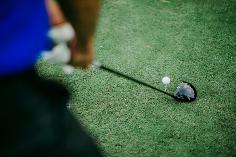 golfer about to hit a driver and avoid slicing it