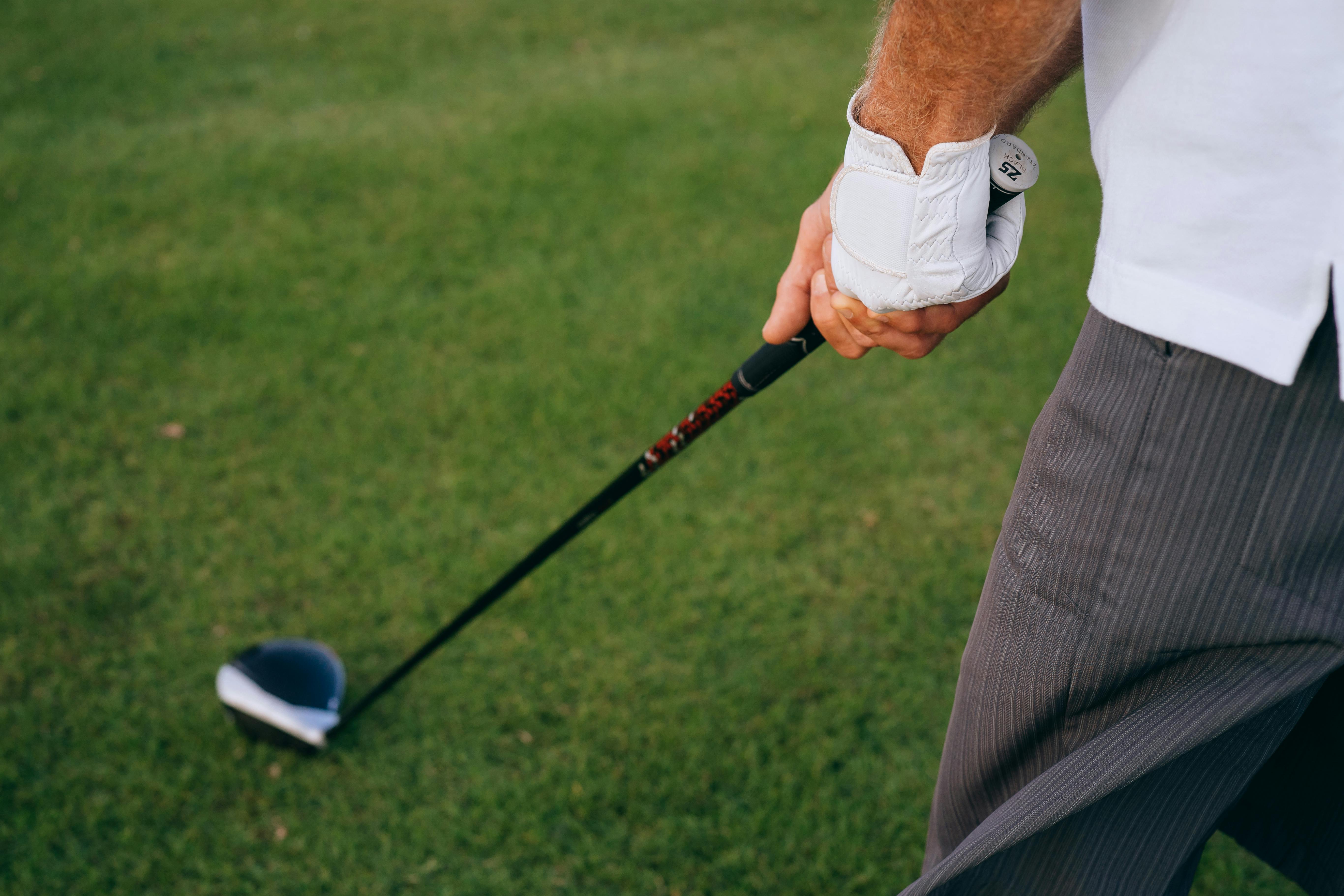 golfer gripping the golf club